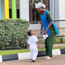 Nanaville caretaker diligently guiding and teaching toddler