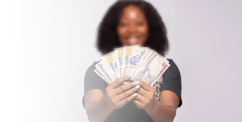 happy-woman-with-money-in-her-hands
