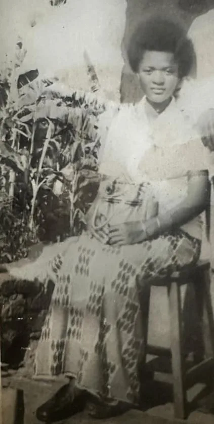 Muky Muguluma honoring his mother Maama Rebecca