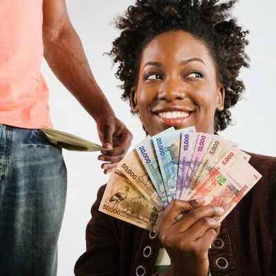african-man-giving-money-to-lady-empty-pockets