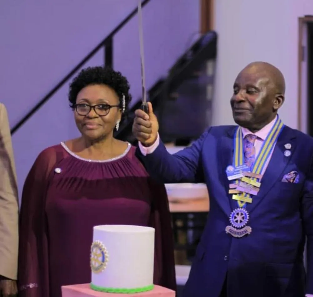 cyprian-male-cutting-cake