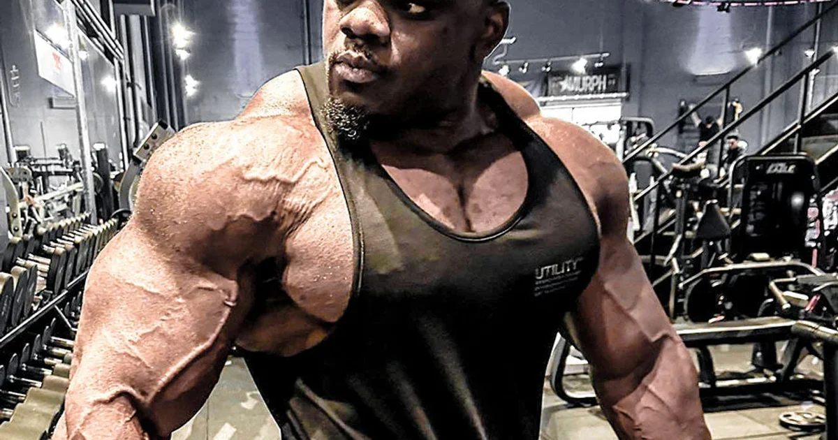 heavily-built-muscle-man-in-black-vest